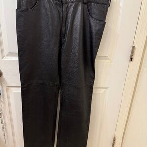 Size 40 genuine black leather biker pants by Reed. Like New